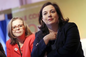 Emmanuelle Cosse (R), Europe Ecologie Les Verts (EELV) ecologist party candidate for the December Regionales elections in the Ile de France region, holds a press conference on November 3, 2015 in Paris to present her candidacy leaders. AFP PHOTO / THOMAS SAMSON